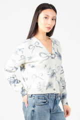 Lyla + Luxe® Kailiebow Cardigan